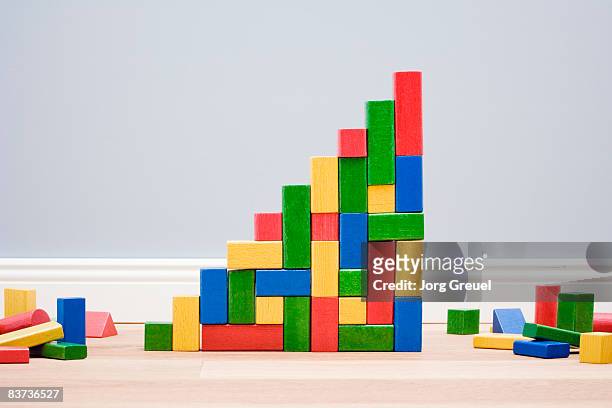 multicolored building blocks in stairs shape - toy block stock pictures, royalty-free photos & images