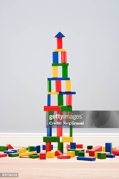 tower made of building blocks - toy building blocks stock pictures, royalty-free photos & images