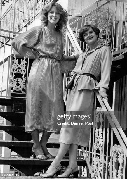 Siubhan's clients, Nancy Rogers, left, in satin-striped chiffon gown , Gayle Ross in dusty pink suit, camisole. Credit: Denver Post, Inc.