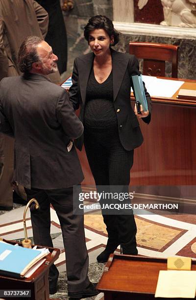 French Justice Minister Rachida Dati talks to UMP MP Olivier Dassault, on November 18, 2008 at the French National Assembly in Paris, during the...