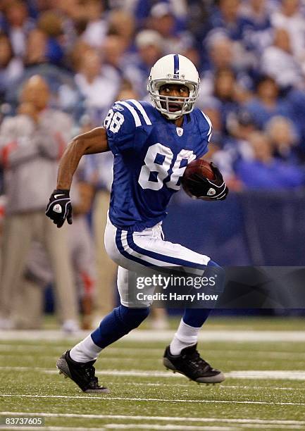 Marvin Harrison of the Indianapolis Colts runs after a catch against the Houston Texans during the game at Lucas Oil Stadium on November 17, 2008 in...