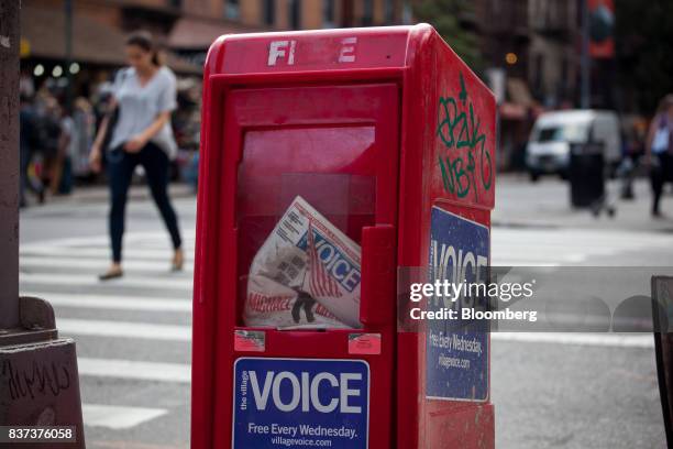 An issue of The Village Voice is seen inside a distribution box in the East Village neighborhood of New York, U.S., on Tuesday, Aug. 22, 2017. Peter...