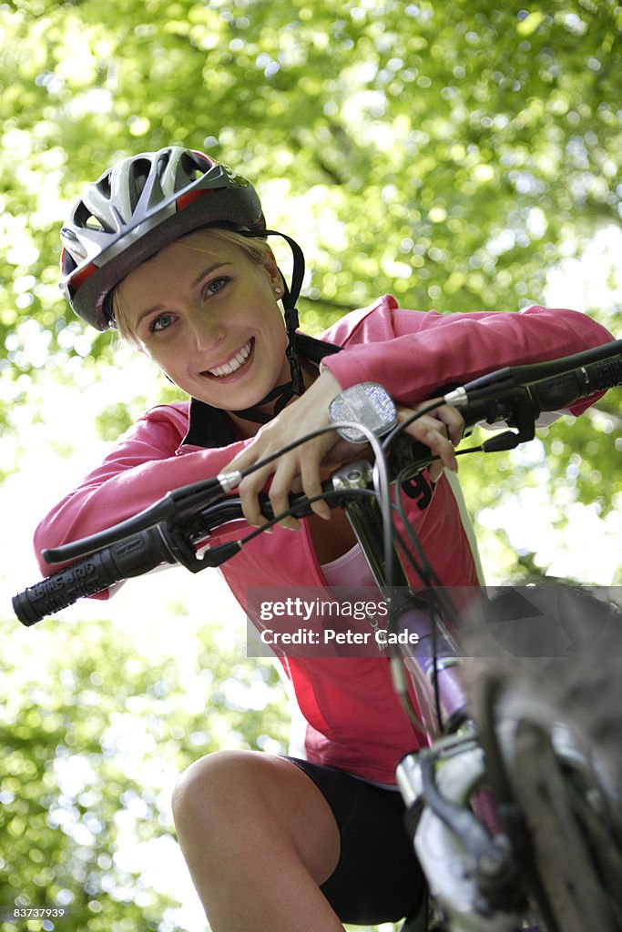 Woman smiling  on bike