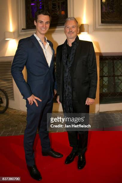 Florian Lang and Mark Hirzberger-Tayler pose for a picture during the 'Inconvenient Sequel' premiere and opening night of the Kitzbuehel Film...