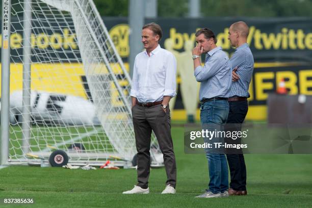 Hans-Joachim Watzke of Dortmund and Michael Zorc of Dortmund looks on during a training session at BVB trainings center on July 10, 2017 in Dortmund.
