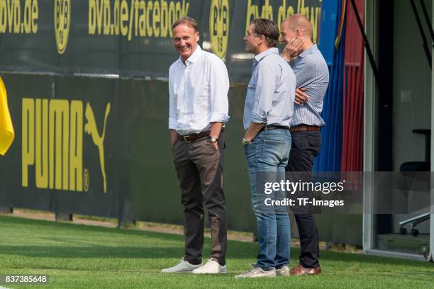 Hans-Joachim Watzke of Dortmund and Michael Zorc of Dortmund looks on during a training session at BVB trainings center on July 10, 2017 in Dortmund.