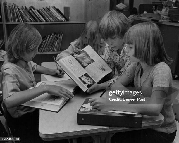 Foster Students Research Life, Works of Norman Rockwell From left are Jackie Kapushion, Donna Jordan, Brad Ward and Debbie Gardner. Credit: Denver...