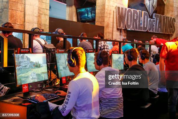 Gaming enthusiasts visit the World of Tanks stand at the Gamescom 2017 gaming trade fair on August 22, 2017 in Cologne, Germany. Gamescom is the...