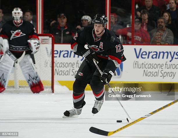 Eric Staal of the Carolina Hurricanes skates with the puck during a NHL game against the Tampa Bay Lighting on November 16, 2008 at RBC Center in...