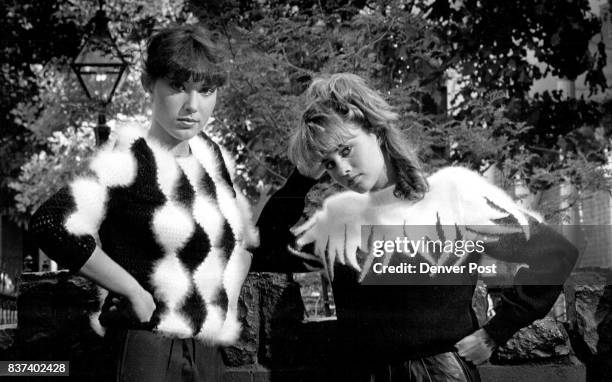 Left, Sonia's harlequin check of wool knit and angora, $390, BetterSweater; right, Ana Rossell's Angora flames, Espirit, $400 Credit: The Denver Post