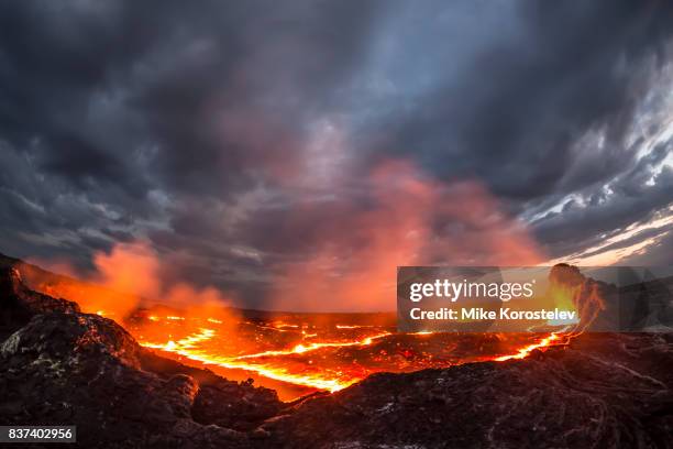 erta ale lava lake - volcanic crater stock pictures, royalty-free photos & images