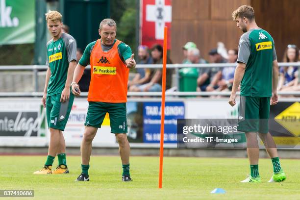 Co-coach Frank Geideck of Borussia Moenchengladbach gestures during a training session at the Training Camp of Borussia Moenchengladbach on July 19,...