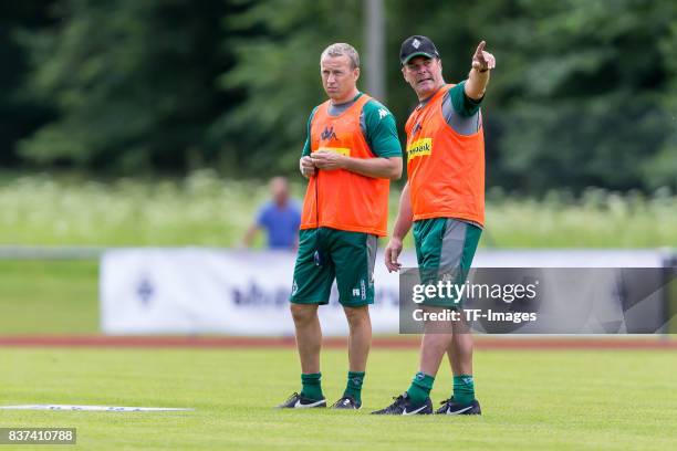 Co-coach Frank Geideck of Borussia Moenchengladbach Head coach Dieter Hecking of Borussia Moenchengladbach gestures during a training session at the...