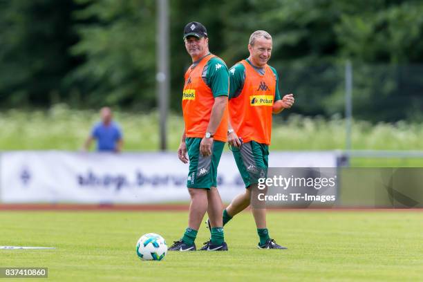 Co-coach Frank Geideck of Borussia Moenchengladbach Head coach Dieter Hecking of Borussia Moenchengladbach looks on during a training session at the...