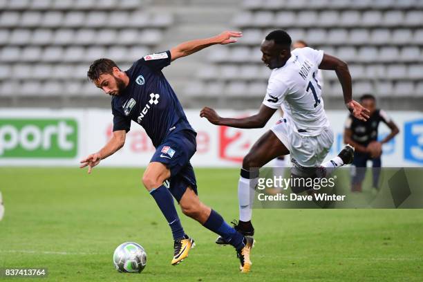 Guillaume Khous of Paris FC and Alassane Ndiaye of Clermont during the French League Cup match between Paris FC and Clermont Foot at Stade Charlety...