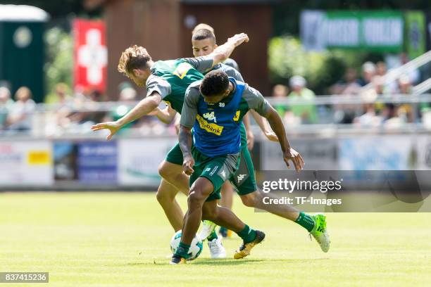 Christoph Kramer of Borussia Moenchengladbach Laszlo Benes of Borussia Moenchengladbach and Kwame Yeboah of Borussia Moenchengladbach battle for the...