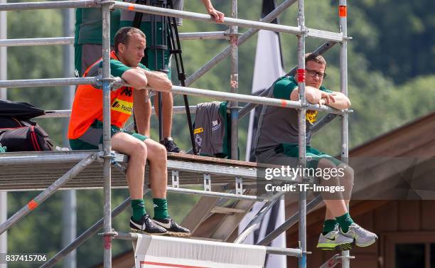 Co-coach Frank Geideck of Borussia Moenchengladbach and Max Eberl of Borussia Moenchengladbach looks on during a training session at the Training...