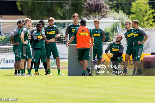 Head coach Dieter Hecking speak with the team during a training session at the Training Camp of Borussia Moenchengladbach on July 19, 2017 in...