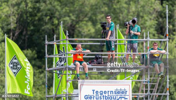 Co-coach Frank Geideck of Borussia Moenchengladbach and Max Eberl of Borussia Moenchengladbach looks on during a training session at the Training...