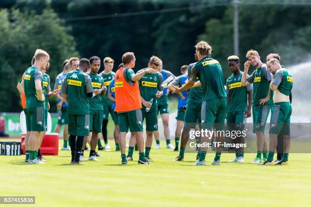 Head coach Dieter Hecking speak with the team during a training session at the Training Camp of Borussia Moenchengladbach on July 19, 2017 in...