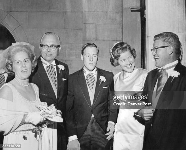 Couples Family Leaves Cathedral For Reception In Polo Grounds Mr. And Mrs. Floyd James Eldridge , left, and son, Tom. Who was best man, chat with...