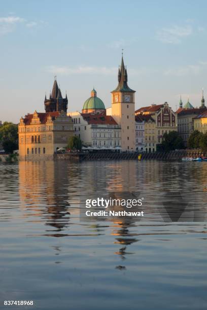 reflection of bedrich smetana museum and staromestska vodarna along vltava river in prague - smetana museum stock pictures, royalty-free photos & images