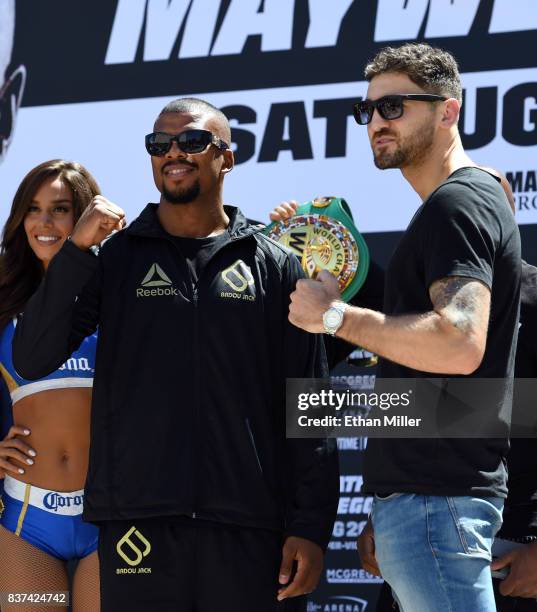 Boxers Badou Jack and WBA light heavyweight champion Nathan Cleverly pose after arriving at Toshiba Plaza on August 22, 2017 in Las Vegas, Nevada....