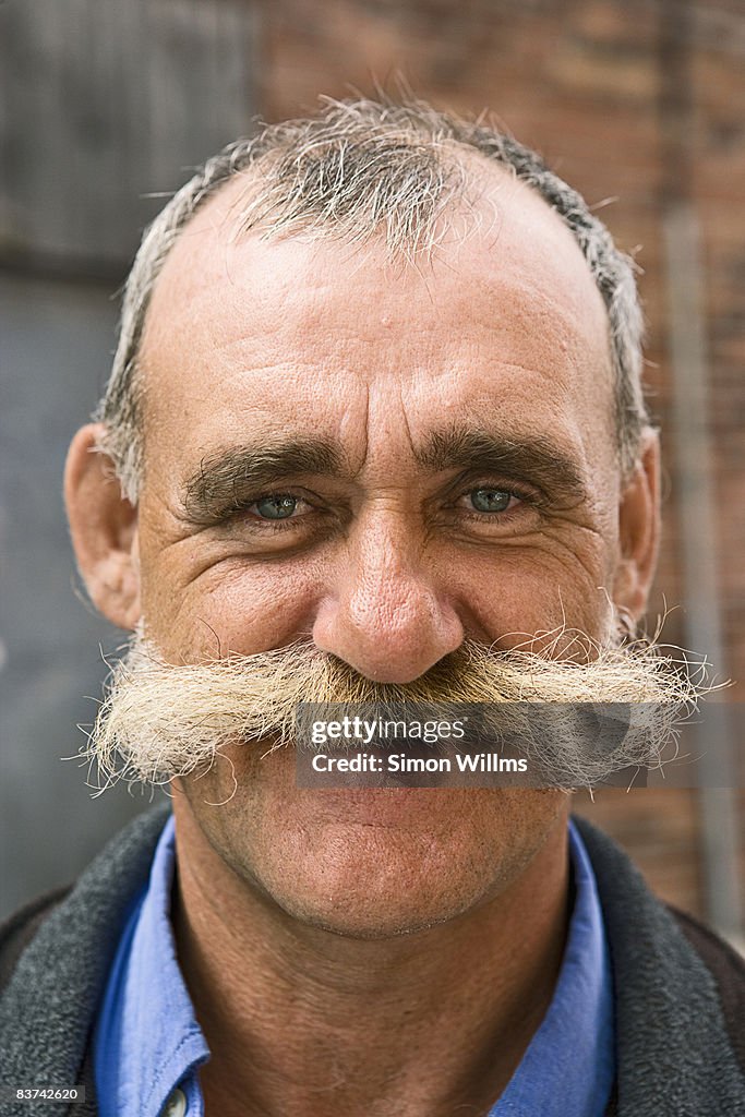 Portrait of man with mustache