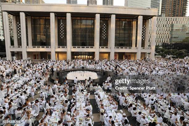 Thousands of diners participate in the annual "Diner en Blanc" at Lincoln Center on August 22, 2017 in New York City. Diner en Blanc began in France...