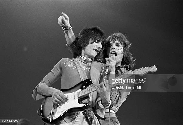 Guitarist Ronnie Wood and singer-frontman Mick Jagger perform with The Rolling Stones at the Omni Coliseum on July 30, 1975 in Atlanta, Georgia.