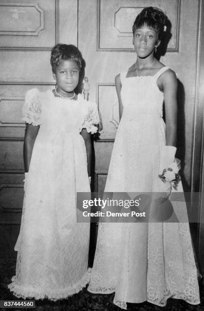 Queens Reign at Escolite Ball Reigning over the Escolite Ball at the Casmopolitan Hotel Saturday were Roslyn Knighten of 2990 Hudson St. Left,...