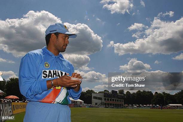 Sachin Tendulkar of India signs some autographs during the one day tour match between Kent and India at Canterbury on June 24, 2002.