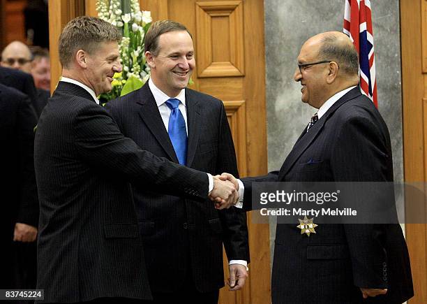 Governor-General of New Zealand Anand Satyanand greets MP and Dept Prime Minister Bill English with Prime Minister John Key during the swearing in...