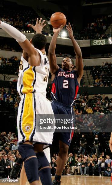 Joe Johnson of the Atlanta Hawks shoots over Danny Granger of the Indiana Pacers at Conseco Fieldhouse on November 18, 2008 in Indianapolis, Indiana....