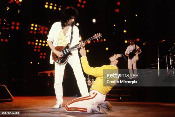 Queen Rock Group Freddie Mercury and Brian May on stage Queen in concert at Wembley Stadium.