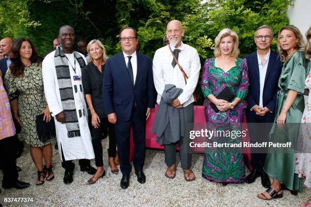 Actress Cristiana Reali, Minister of Culture of "Cote d'Ivoire", Maurice Kouakou Bandaman, journalist Claire Chazal, Former French President Francois...