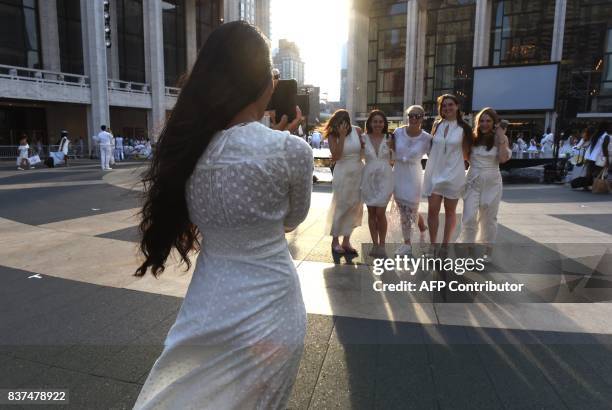 Guest attend the annual New York City Diner en Blanc, August 22, 2017 held this year at the plaza at Lincoln Center. The Diner en Blanc, the worlds...