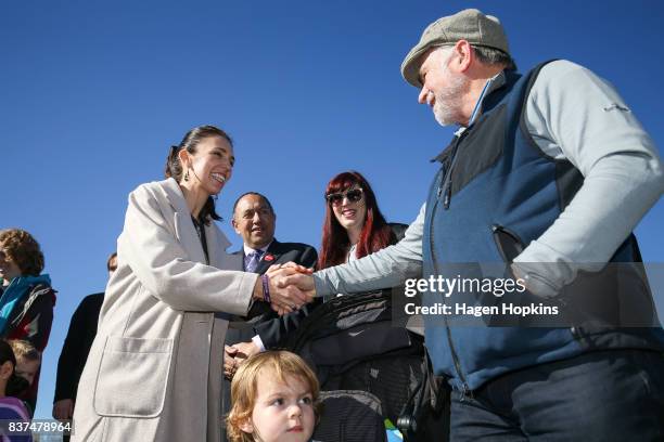 Labour leader Jacinda Ardern speaks to a supporter during a housing announcement at Farnham Park on August 23, 2017 in Palmerston North, New Zealand....