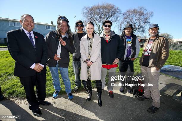 Labour leader Jacinda Ardern and MP for Te Tai Hauauru, Adrian Rurawhe , pose with supporters during a housing announcement at Farnham Park on August...