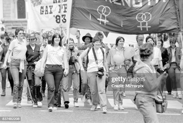 Lesbian and Gay Pride March 1983 through the streets of central London escorted by police. June 1983.