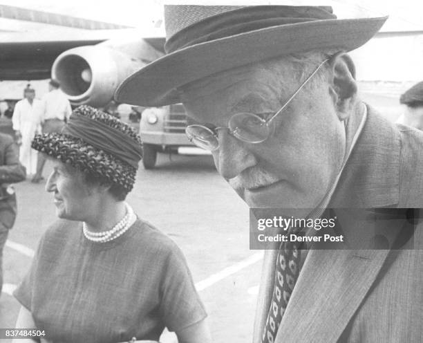 Allen W. Dulles Arrives With His Wife, Clover, At Stapleton Field He said unveiling of spies in Britain means "Security is getting better, not...