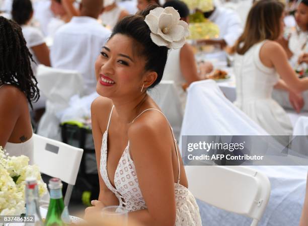 Guest Courtney Chung attends the annual New York City Diner en Blanc, August 22, 2017 held this year at the plaza at Lincoln Center. The Diner en...