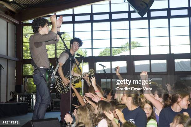 Nick Jonas, Joe Jonas and Kevin Jonas of the Jonas Brothers performs onstage at The Ross School on August 9, 2008 in East Hampton, New York.