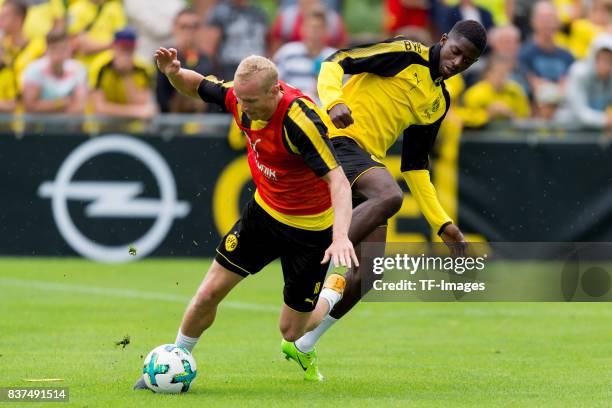 Sebastian Rode of Dortmund and Ousmane Dembele of Dortmund controls the ball during a training session as part of the training camp on July 31, 2017...