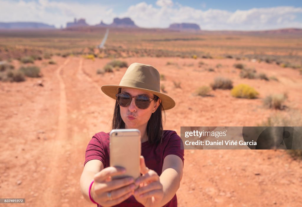 Young woman at Monument Valley