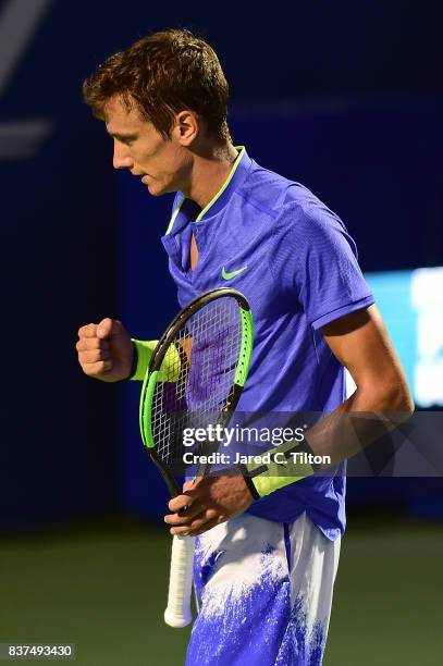 Andrey Kuznetsov of Russia reacts after a point against John Isner during the fourth day of the Winston-Salem Open at Wake Forest University on...