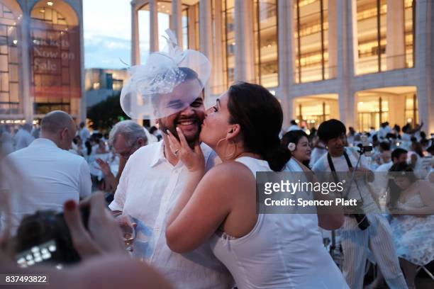 Diners participate in the annual "Diner en Blanc" at Lincoln Center on August 22, 2017 in New York City. Diner en Blanc began in France nearly 30...