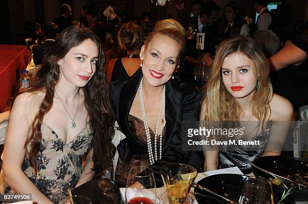 Elizabeth Jagger, Jerry Hall and Georgia May Jagger attend a cocktail reception as Vivienne Westwood presented her Gold Label Collection in...