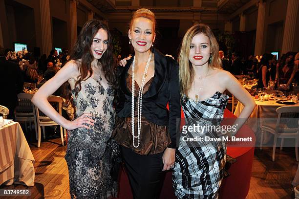 Elizabeth Jagger, Jerry Hall and Georgia May Jagger attend a cocktail reception as Vivienne Westwood presented her Gold Label Collection in...