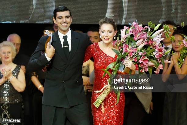 German Ballejo and Magdalena Gutierrez of Argentina celebrate after winning the final round of the Tango Salon competition as part of the Buenos...